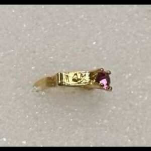 Tiny 14k gold mini charm / pendant with ruby stone